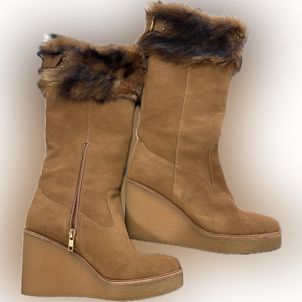 Ugg wedge boots with faux fur around the top. Worn once.